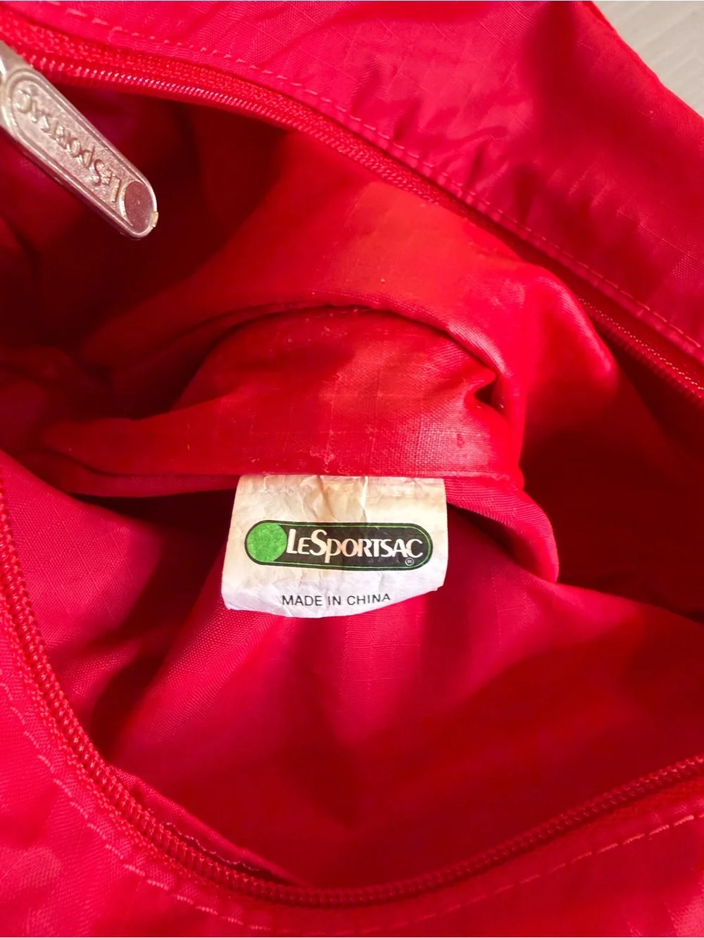 LeSportsac Compact Red Crossbody Bag with and matching coin purse